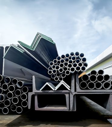 Stacked,Steel,Pipes,With,Construction,Steel,,Black,Pipe,metal,Tubes,,Angle